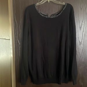 Sweater with bow detail on the back.